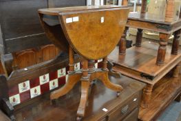 A Victorian walnut small drop leaf table.