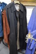A ladies' Aquascutum raincoat, a ladies' suede full length coat and three other items.