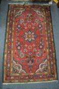 A small Persian rug.