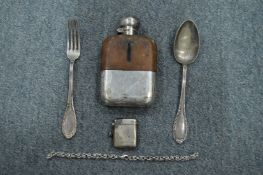 A silver vesta case, a hip flask and other items.