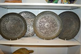 Four early eastern tinned copper circular chargers.