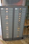 A pair of metal multi-drawer filing chests.