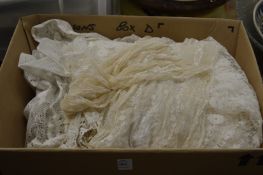A box of lace and linen.