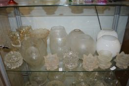 Various etched glass and other lampshades.