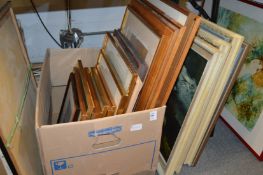 A quantity of paintings and prints.