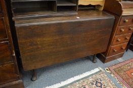 A mahogany drop leaf gateleg dining table.