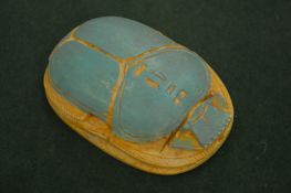 A large Egyptian style scarab beetle.