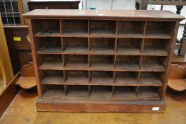 Mahogany pigeonholes.