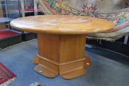An unusual inlaid circular nautical themed coffee table.