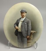 A VICTORIAN OVAL PORCELAIN PLAQUE. Portrait of a man, 14ins x 12ins.