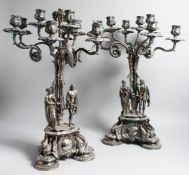 A GOOD PAIR OF VICTORIAN ELKINGTON PLATE, NINE LIGHT CANDELABRA with scrolling branches with three