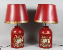 A PAIR OF RED PAINTED TOLE WARE TEA CANISTER STYLE LAMPS with shades. 28.5ins high overall.