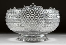 A VERY GOOD CUT GLASS SHIELD SHAPED CIRCULAR BOWL with star cut base. 9ins diameter.