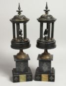 AFTER THE ANTIQUE. A PAIR OF MARBLE AND METAL ARCHITECTURAL ROTUNDAS ON STANDS 16ins high.