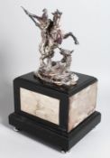 A SUPERB WHITE METAL STATUE OF SAINT GEORGE SLAYING THE DRAGON. 8.5ins high, on a black marbled