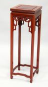 A 20TH CENTURY CHINESE REDWOOD SQUARE SHAPED TALL STAND. 1ft wide x 3ft high.