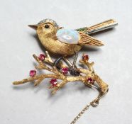A SUPERB GOLD, OPAL, DIAMOND AND RUBY SET BIRD on a branch.