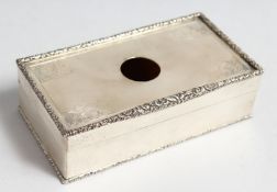 AN ENGINE TURNED SILVER RECTANGULAR SNUFF BOX, London, 1924 5ins long with inscription.