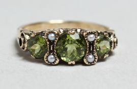 A 9ct GOLD, PERIDOT, AND PEARL RING.