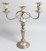 A SILVER THREE LIGHT, TWO BRANCH CANDELABRA, 16ins high, one sconce missing, London, 1964, RAMC