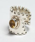 A CHUNKY SILVER CITRINE RING.