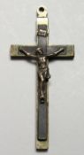 A SMALL CRUCIFIX. 4.25ins long