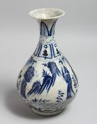 A CHINESE BLUE AND WHITE BULBOUS SHAPED VASE painted with figures in a landscape. 13ins high.