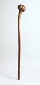 A GOOD TRIBAL THROWING CLUB crosshatch handle, nice colour and patina. 30ins long.