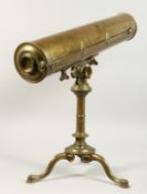 AN 18TH CENTURY REFLECTIVE BRASS TELESCOPE on a tripod stand.