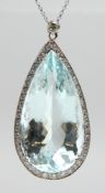 A SUPERB 18CT WHITE GOLD, EDWARDIAN, 65CT AQUAMARINE AND DIAMOND TEARDROP PENDANT.