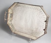 A VICTORIAN SILVER MAPPPIN AND WEBB PLATED TWO HANDLED TEA TRAY with pierced gallery on curving