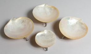 FOUR VARIOUS MOTHER OF PEARL SHELL DISHES.