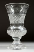 A GOOD THISTLE SHAPED VASE. hobnail cut with garlands, 12ins high.