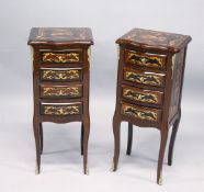 A PAIR OF FRENCH STYLE MARQUETRY INLAID FOUR DRAWER BEDSIDE CHESTS ON CURVING LEGS. 2ft 7ins high