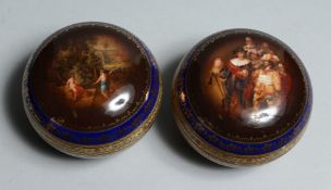 A PAIR OF VIENNA CIRCULAR PORCELAIN BOXES AND COVERS 3.5ins high.