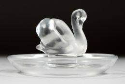 A LALIQUE SWAN ASHTRAY, 3.5ins diameter.