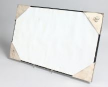 A GARRARD & CO. SILVER EDGED BLOTTER, with RAMC crest.