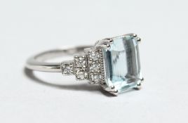 AN 18CT WHITE GOLD, AQUAMARINE AND DIAMOND RING