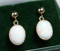 A PAIR OF SILVER AND OPAL DROP EARRINGS