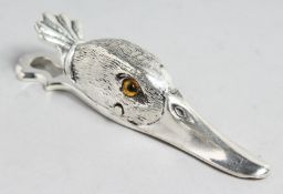 A SILVER PLATE DUCK PAPER CLIP.