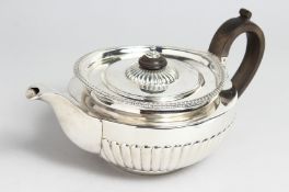 A GEORGE III SILVER TEA POT by William Burwash London 1818, weighs 24ozs.