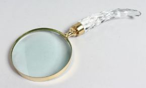 A MAGNIFYING GLASS with CUT GLASS handle.