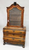 AN 18TH CENTURY DUTCH WALNUT AND MARQUETRY CABINET ON CHEST with a shaped cornice above a single
