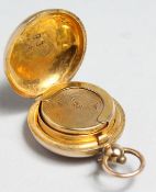 A 9CT GOLD FOB SOVEREIGN HOLDER.