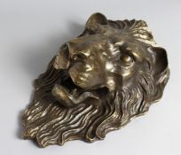 A CAST BRONZE LION MASK WALL PLAQUE. 18ins high.`