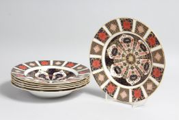 A SET OF SIX ROYAL CROWN DERBY OLD IMARI PATTERN CIRCULAR BOWLS, no. 1128. 8.5ins high.