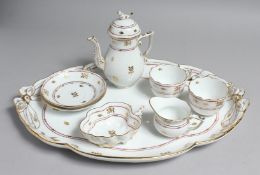 A GOOD HERANED CABERET, comprising of oval tray, two cups and saucers, milk jug, cream bowl and