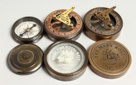 THREE SMALL REPLICA COMPASSES.