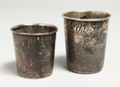 TWO SILVER THIMBLE-SHAPED CUPS engraved 