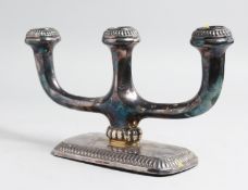 A STERLILNG SILVER TWO BRANCH, THREE LIGHT, GERMAN CANDELABRA, 6ins high.
